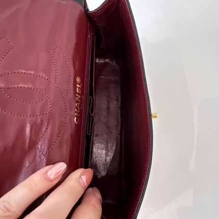 Sac Chanel vintage noir fermoir bicolore