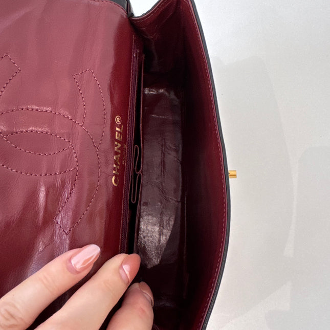 Sac Chanel vintage noir fermoir bicolore
