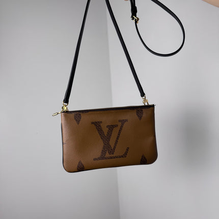 Pochette double zip Louis Vuitton