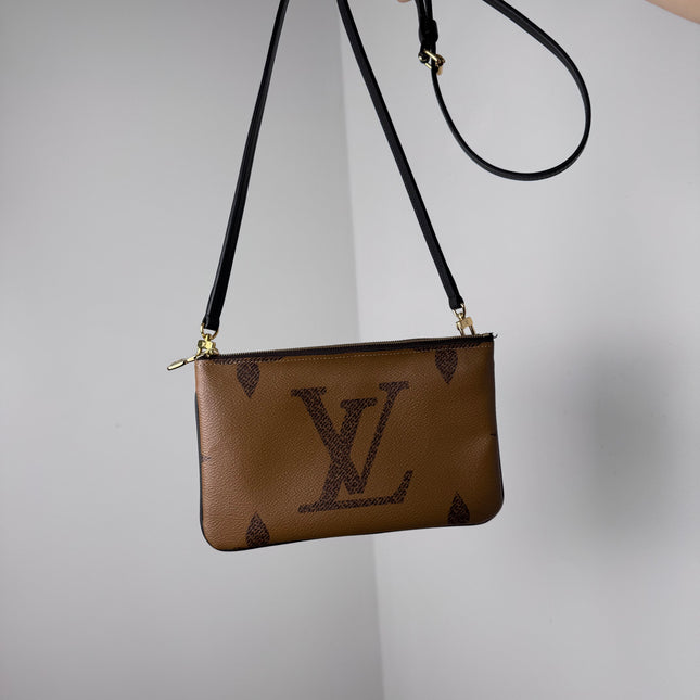 Pochette double zip Louis Vuitton