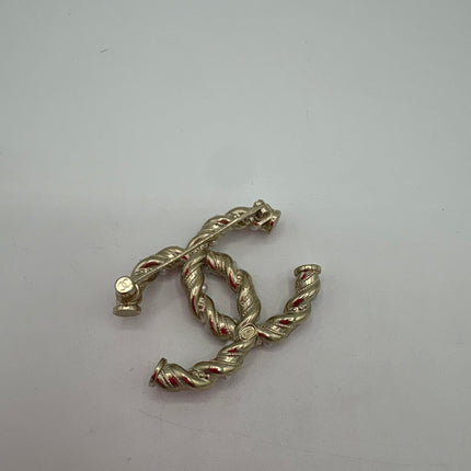 Broche Chanel double c perles