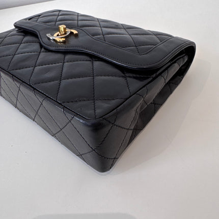 Sac Chanel vintage noir fermoir bicolore
