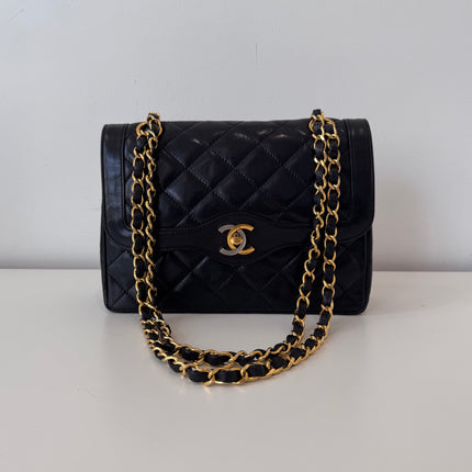 Sac Chanel vintage noir fermoir bicolore