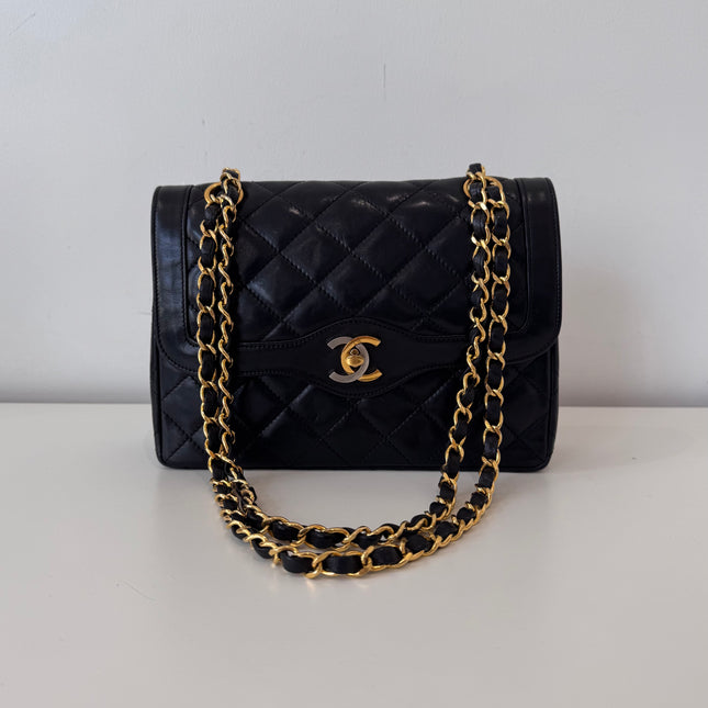 Sac Chanel vintage noir fermoir bicolore