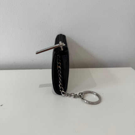 Porte-monnaie Chanel cuir caviar noir