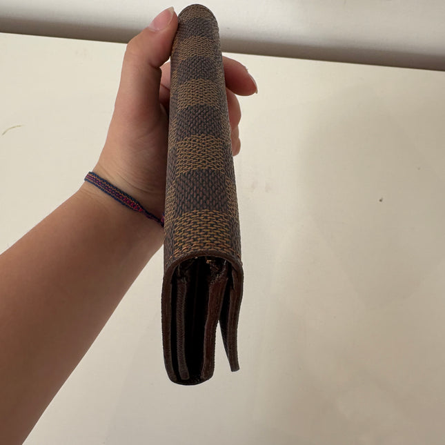 Porte monnaie/ portefeuille Louis Vuitton