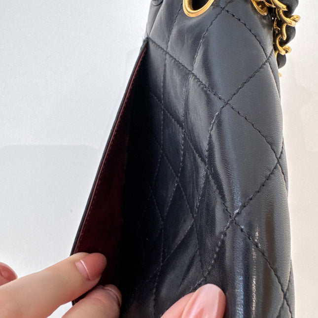 Sac Chanel vintage noir fermoir bicolore