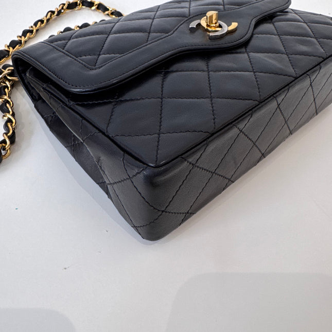 Sac Chanel vintage noir fermoir bicolore