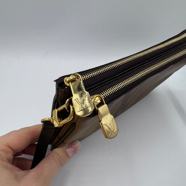 Pochette double zip Louis Vuitton