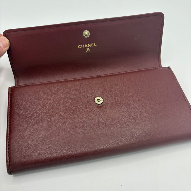 Portefeuille Chanel rouge éteint