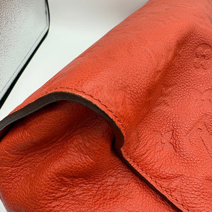 Sac Louis Vuitton Lumineuse cuir empreinte rouge