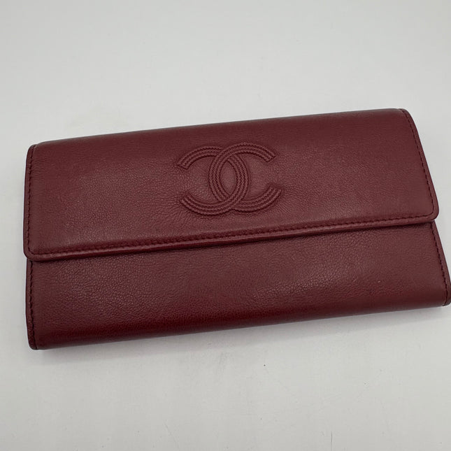 Portefeuille Chanel rouge éteint