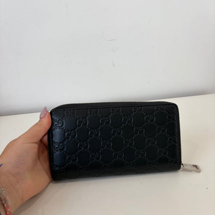 Portefeuille Gucci GG zippé cuir noir