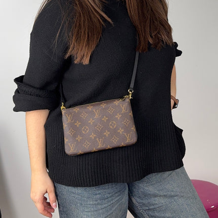 Pochette double zip Louis Vuitton