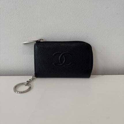 Porte-monnaie Chanel cuir caviar noir