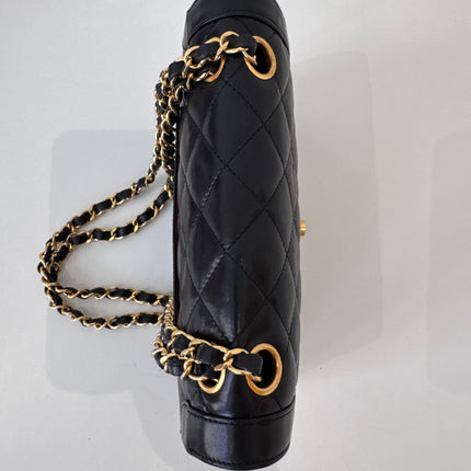 Sac Chanel vintage noir fermoir bicolore