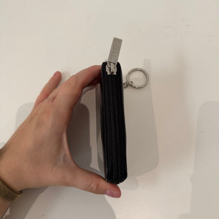 Porte-monnaie Chanel cuir caviar noir