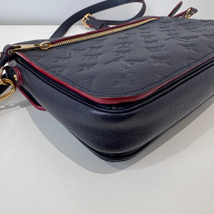 Pochette Métis Louis Vuitton Cuir empreinte marine