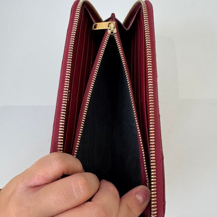 Portefeuille Saint Laurent Cassandre zip Bordeaux