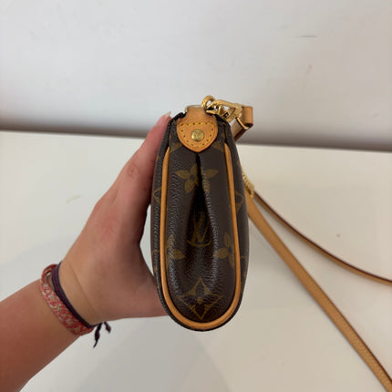 Sac pochette Louis Vuitton Eva Monogram