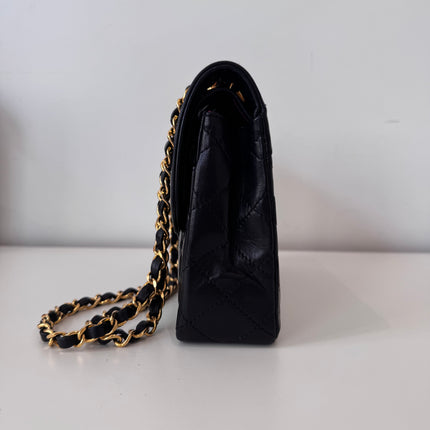Sac Chanel vintage noir fermoir bicolore