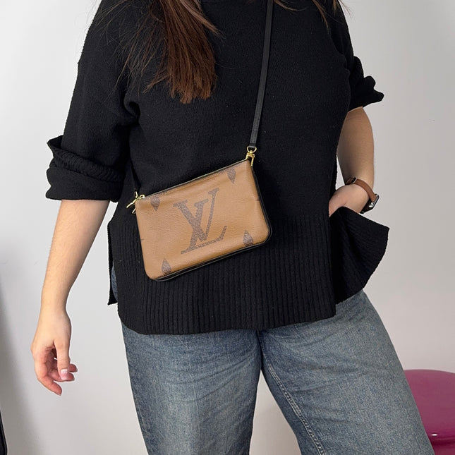 Pochette double zip Louis Vuitton
