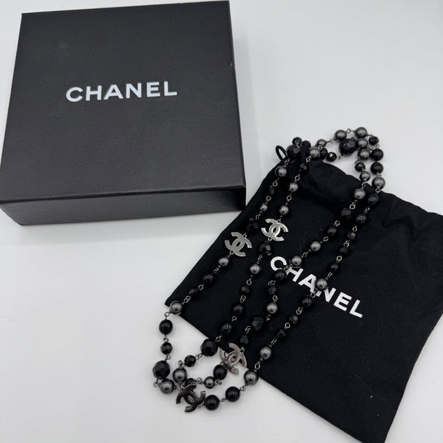 Sautoir Chanel perles noires