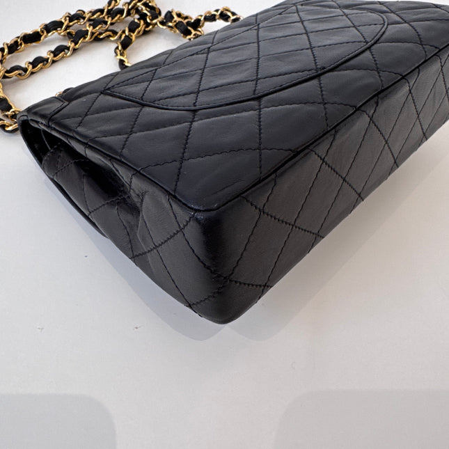 Sac Chanel vintage noir fermoir bicolore