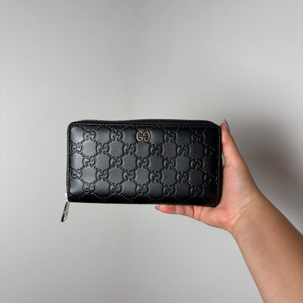 Portefeuille Gucci GG zippé cuir noir