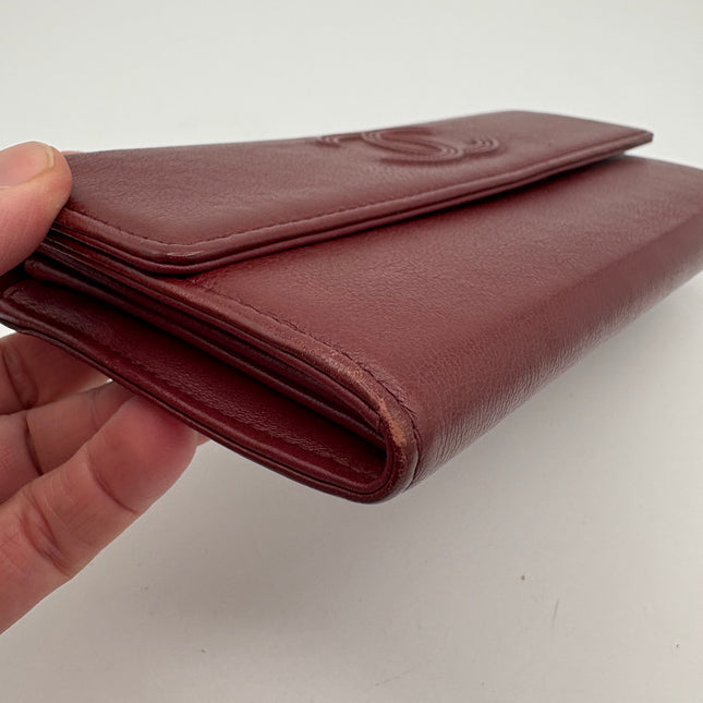 Portefeuille Chanel rouge éteint