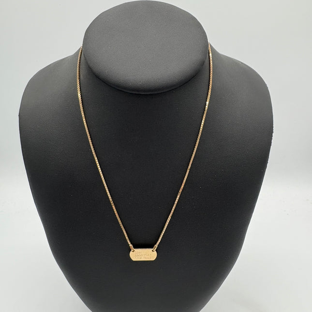 Collier Dior étiquette John Galliano 1947