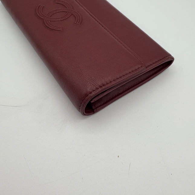Portefeuille Chanel rouge éteint