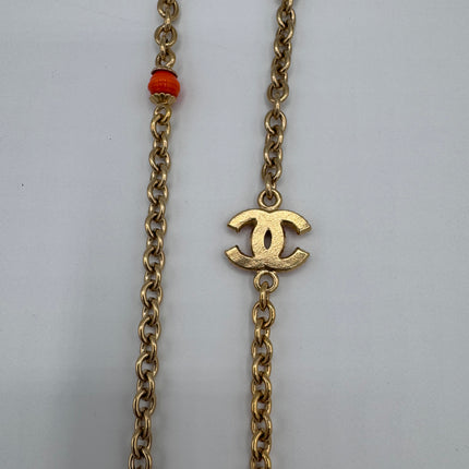 Sautoir Chanel double C doré et orange