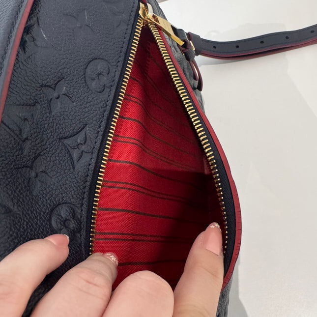 Pochette Métis Louis Vuitton Cuir empreinte marine