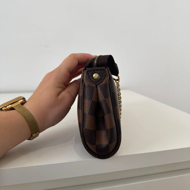 Sac pochette Eva damier ébène