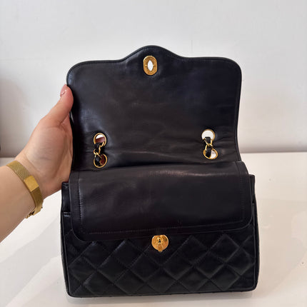 Sac Chanel vintage noir fermoir bicolore