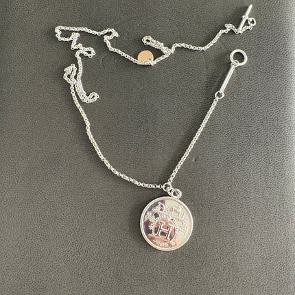 Collier Hermès ex libris