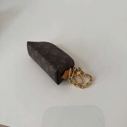 Pochette Louis Vuitton Cosmétique rouge à lèvres