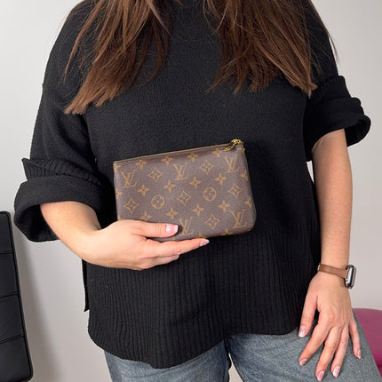 Pochette double zip Louis Vuitton