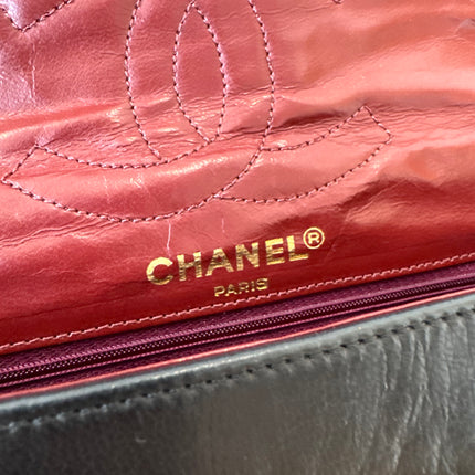 Sac Chanel vintage noir fermoir bicolore