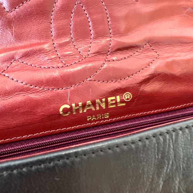 Sac Chanel vintage noir fermoir bicolore