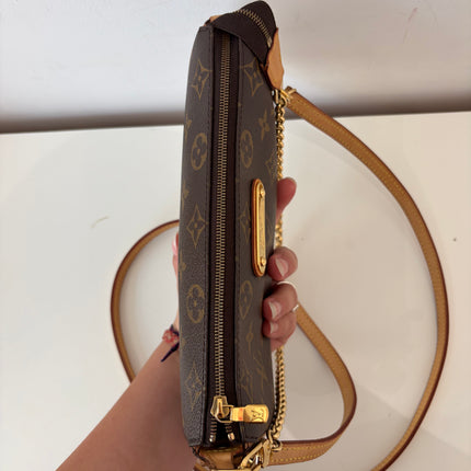 Sac pochette Louis Vuitton Eva Monogram