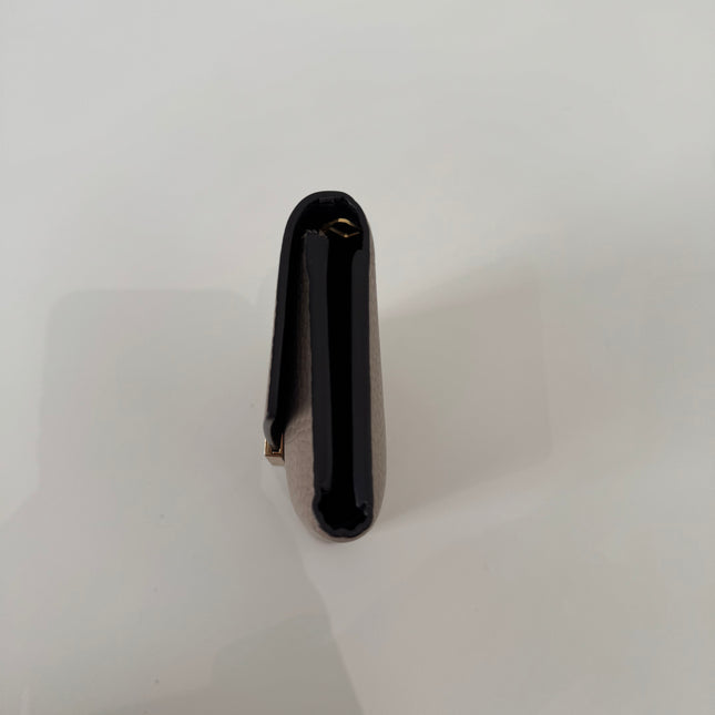 Portefeuille Louis Vuitton Capucines Compact