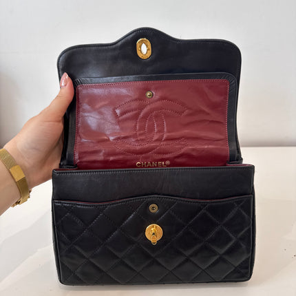 Sac Chanel vintage noir fermoir bicolore