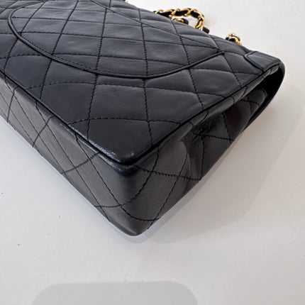 Sac Chanel vintage noir fermoir bicolore