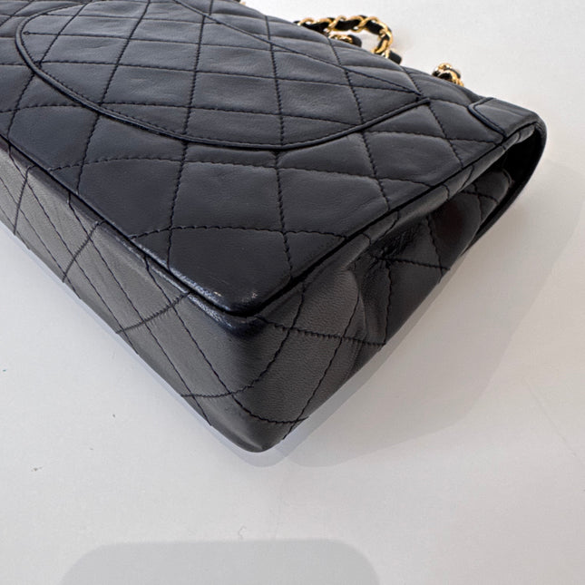 Sac Chanel vintage noir fermoir bicolore