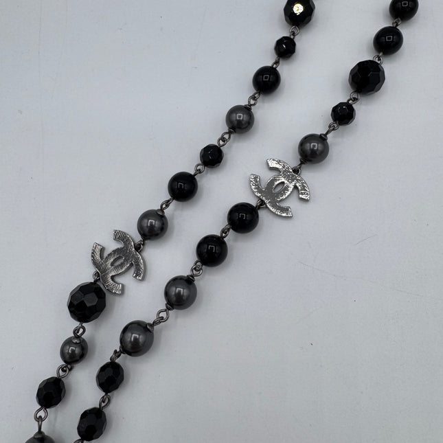 Sautoir Chanel perles noires