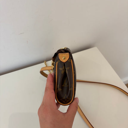 Sac pochette Louis Vuitton Eva Monogram