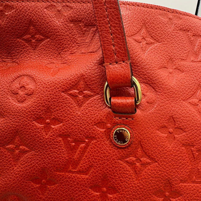 Sac Louis Vuitton Lumineuse cuir empreinte rouge