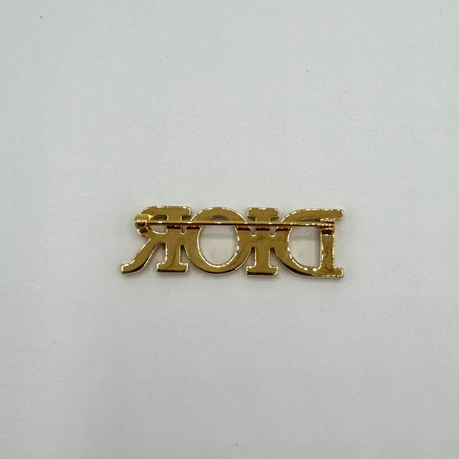 Broche Dior R(E)volution